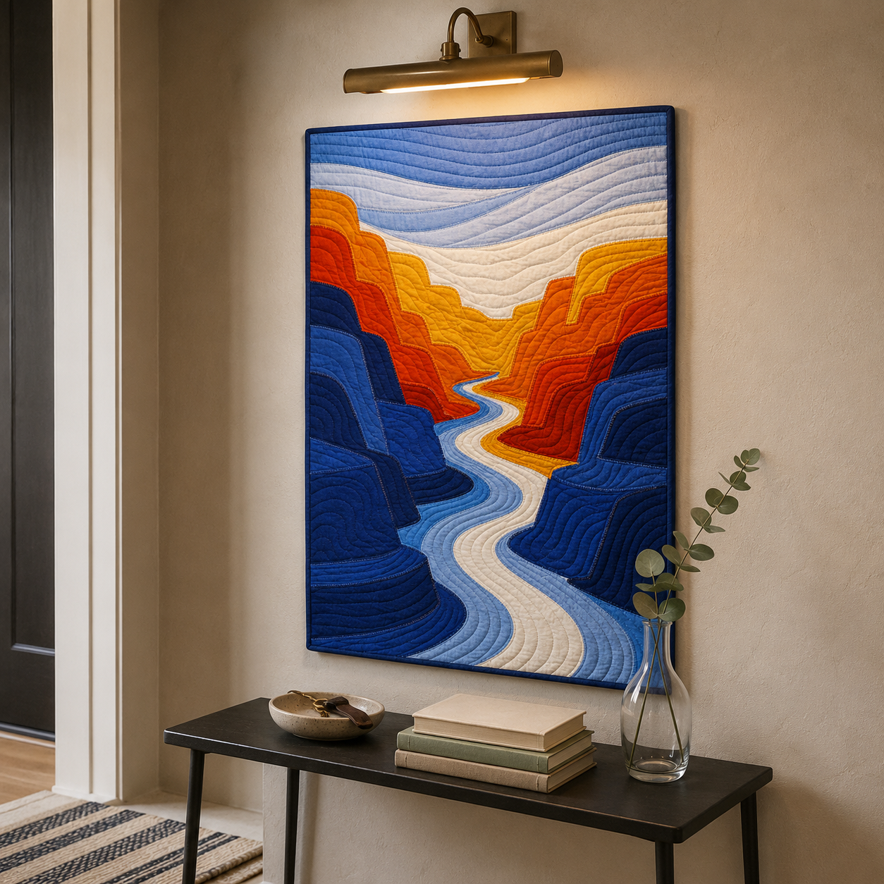 Canyon River modern landscape quilt framed as wall art above a console table — desert canyon scene textile décor
